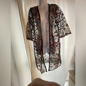Vivid Importers of NY Super cute!
Kimono  black  w colorful embroidery XL
